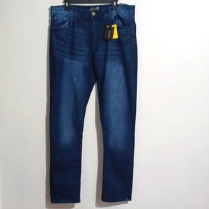 NWT size 36 Mens denim. LION DYNASTY blue jeans. "Pre-Shrunk, Comfort, Stretch"